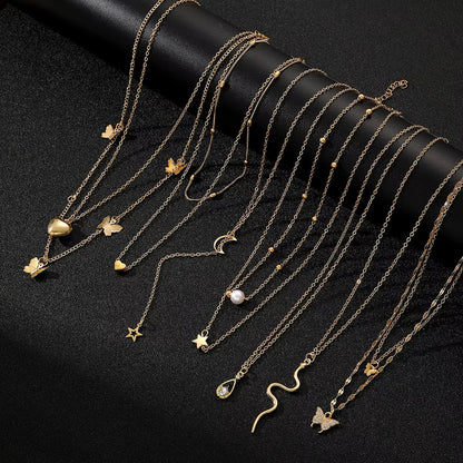 9 Pcs Multi-layered Gold Color Necklace Set for Women Fashion Zircon Pearl Heart Butterfly Star Moon Snake Pendant Necklaces Set