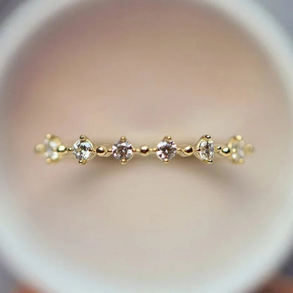 Huitan Dazzling Small Cubic Zirconia Rings for Women Gold Color Minimalist Thin Band Temperament Finger-ring Statement Jewelry