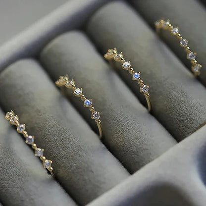 Huitan Dazzling Small Cubic Zirconia Rings for Women Gold Color Minimalist Thin Band Temperament Finger-ring Statement Jewelry