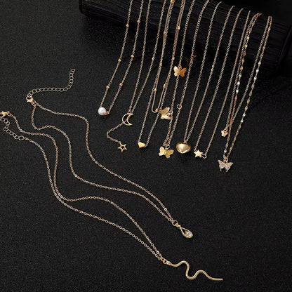 9 Pcs Multi-layered Gold Color Necklace Set for Women Fashion Zircon Pearl Heart Butterfly Star Moon Snake Pendant Necklaces Set